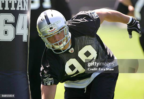 Matt Shaughnessy of the Oakland Raiders runs drills during the Raiders minicamp at the team's permanent training facility on May 8, 2009 in Alameda,...