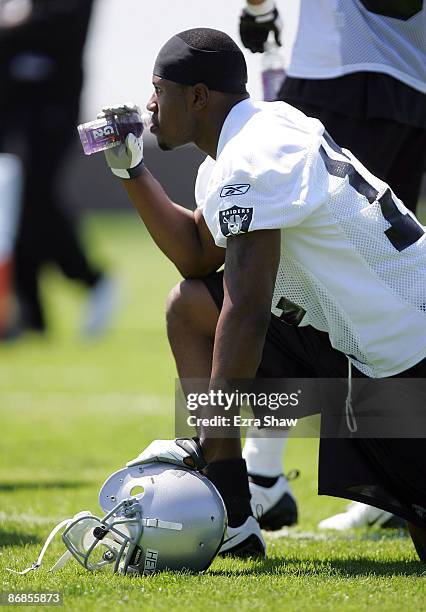 Darrius Heyward-Bey of the Oakland Raiders takes a drink of Gatorade during the Raiders minicamp at the team's permanent training facility on May 8,...