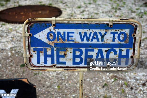 one way to the beach - beach sign stock pictures, royalty-free photos & images