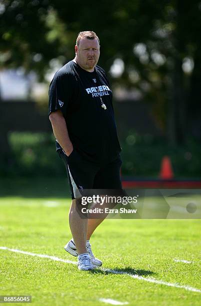 Oakland Raiders coach Tom Cable watches his team during the Raiders minicamp at the team's permanent training facility on May 8, 2009 in Alameda,...