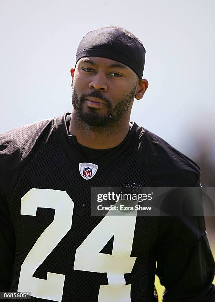 Michael Huff of the Oakland Raiders takes a break during the Raiders minicamp at the team's permanent training facility on May 8, 2009 in Alameda,...