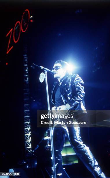 Bono of U2 perform on stage on the Zoo TV Tour, Estadio Jose Alvalade, Lisbon, Portugal, 15 May 1993.