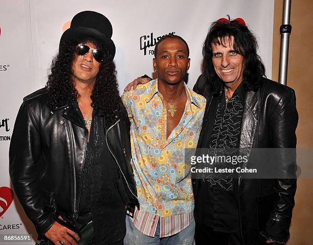Musician Slash, actor/comedian Tommy Davidson and musician Alice Cooper during The 4th Annual MusiCares MAP Fund Benefit Concert at The Music Box on...