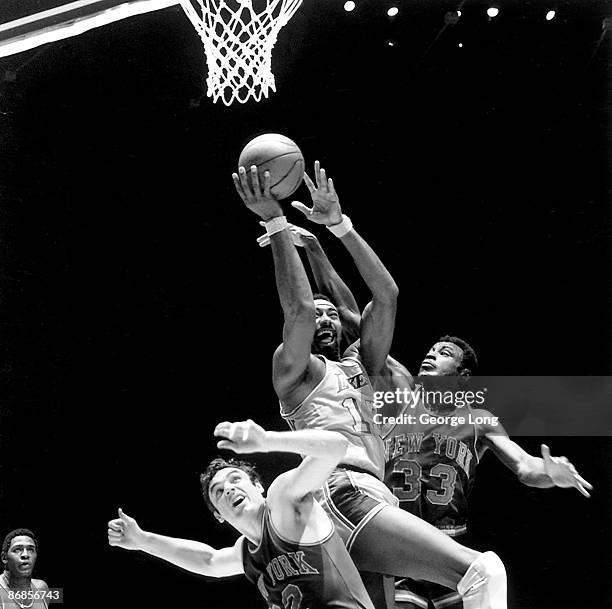 Finals: Los Angeles Lakers Wilt Chamberlain in action vs New York Knicks Dave Debuschre and Cazzie Russell . Game 3. Inglewood, CA 4/29/1970 CREDIT:...