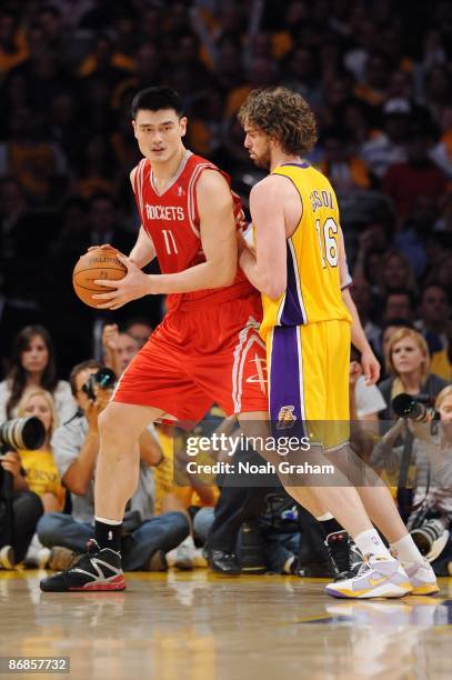 Yao Ming of the Houston Rockets posts up against Pau Gasol of the Los Angeles Lakers in Game One of the Western Conference Semifinals during the 2009...