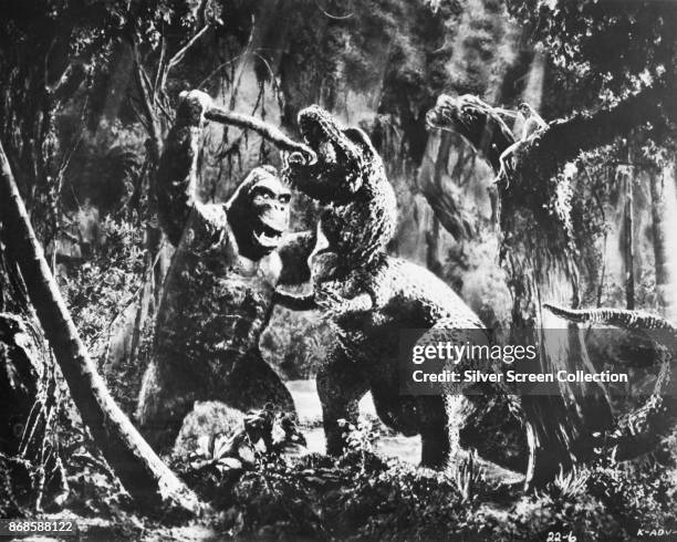 View of King Kong battling a Tyrannosaurus in a scene from 'King Kong' , 1933.