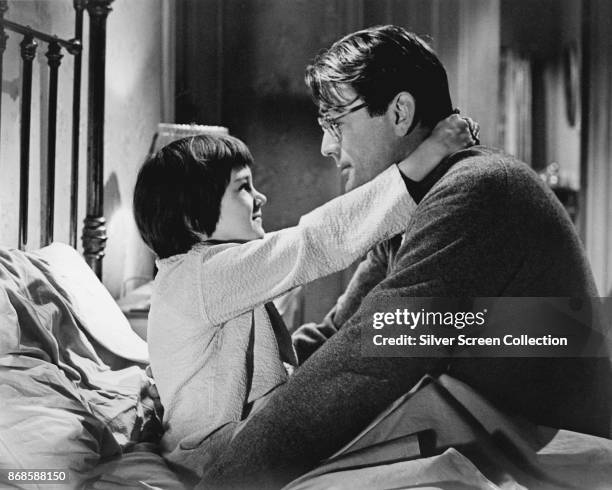 American actors Mary Badham and Gregory Peck in a scene from 'To Kill a Mockingbird' , 1962.