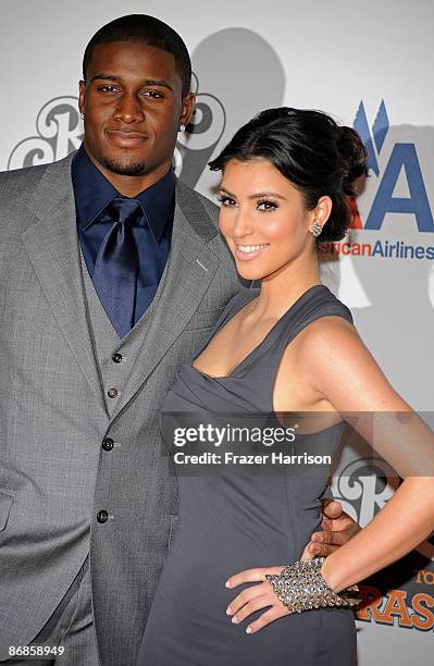 Player Reggie Bush and TV personality Kim Kardashian arrive at the 16th Annual Race to Erase MS event themed "Rock To Erase MS" co-chaired by Nancy...