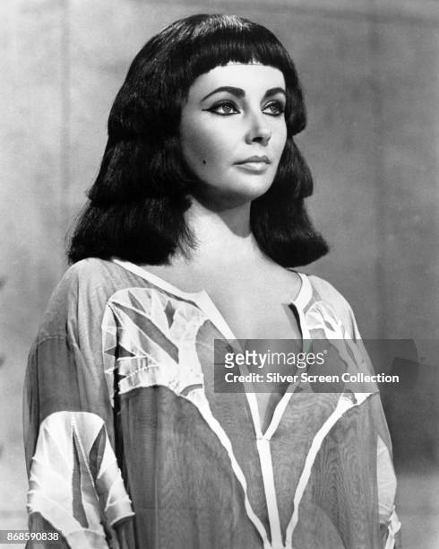 Portrait of British-American actress Elizabeth Taylor during a wardrobe test for her role in the film 'Cleopatra' , Rome, Italy, September 24, 1961.