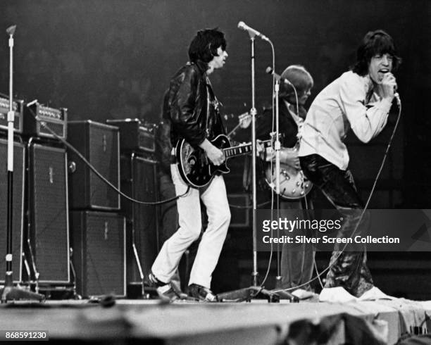 English Rock group the Rolling Stones perform onstage at an unspecified venue, mid to late 1960s. Pictured are, from left, Keith Richards and Brian...