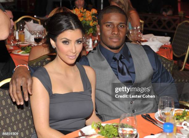 Socialite Kim Kardashian and NFL Player Reggie Bush attend the 16th Annual Race to Erase MS event co-chaired by Nancy Davis and Tommy Hilfiger at...