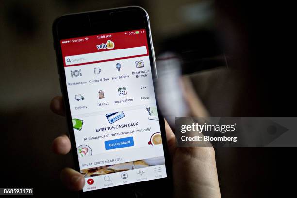 The Yelp Inc. Application is displayed for a photograph on an Apple Inc. IPhone in Washington, D.C., U.S., on Saturday, Oct. 28, 2017. Yelp Inc. Is...