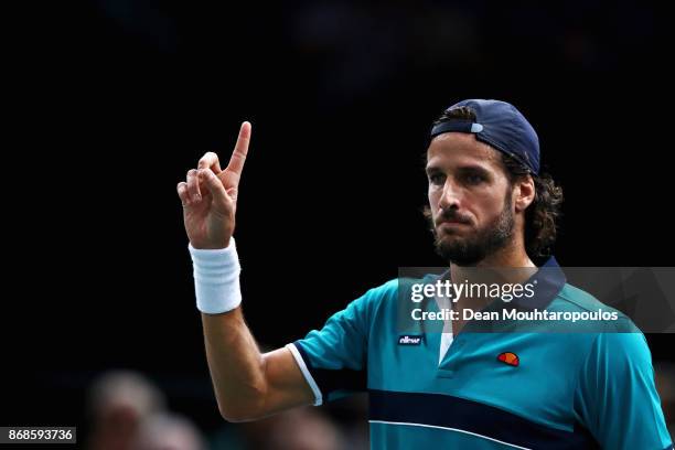 Feliciano Lopez of Spain calls for a hawk eye decision against Pierre-Hugues Herbert of France during Day 2 of the Rolex Paris Masters held at the...