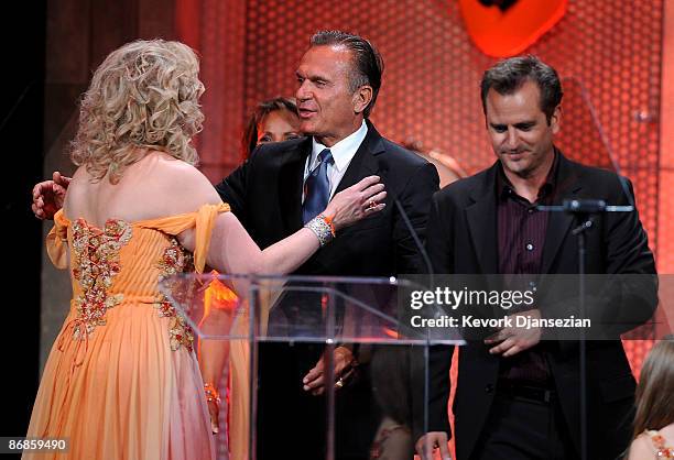 Co-chair Nancy Davis, Dr. Andrew Ordon and Dr. Jim Sears speak onstage during the 16th Annual Race to Erase MS event themed "Rock To Erase MS"...