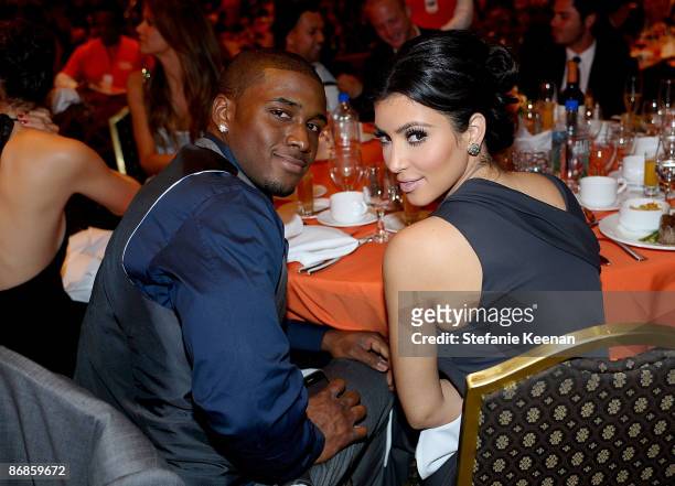 Tv personality Kim Kardashian and athlete Reggie Bush attends the 16th Annual Race to Erase MS event co-chaired by Nancy Davis and Tommy Hilfiger at...