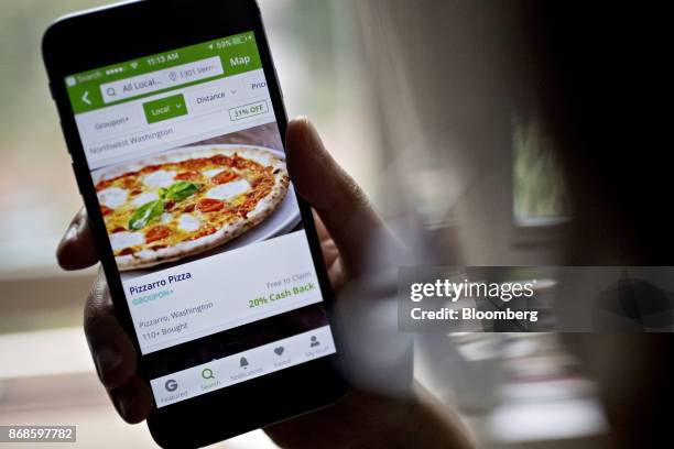 The Groupon Inc. Application is displayed on for a photograph an Apple Inc. IPhone in Washington, D.C., U.S., on Saturday, Oct. 28, 2017. Groupon...