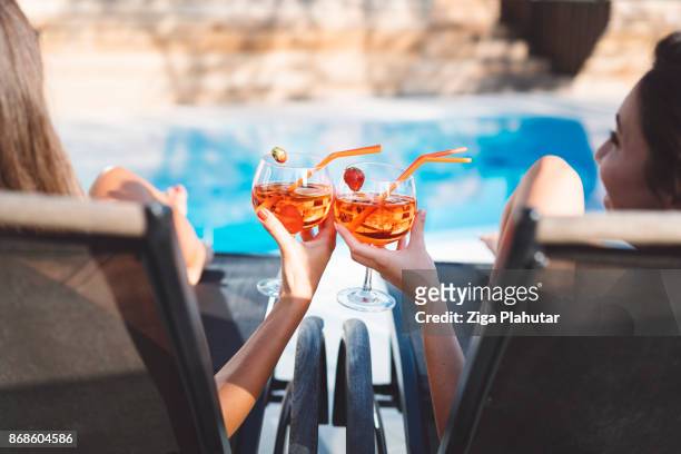 cheers to the teenage years - swimming pool stock pictures, royalty-free photos & images