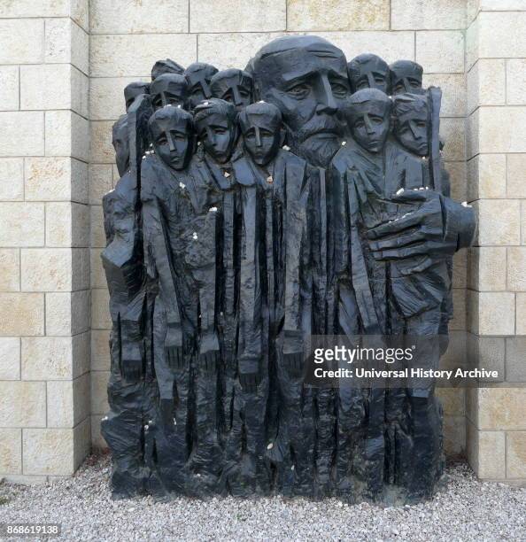 Korczak and the Ghetto's Children, sculpture by Boris Saktsier , Yad Vashem Memorial, Israel. Janusz Korczak, the pen name of Henryk Goldszmit, , was...