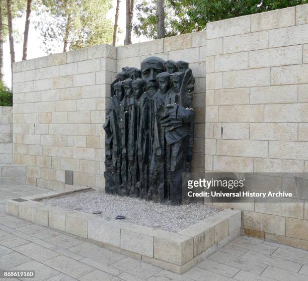 Korczak and the Ghetto's Children, sculpture by Boris Saktsier , Yad Vashem Memorial, Israel. Janusz Korczak, the pen name of Henryk Goldszmit, , was...