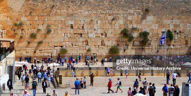 The Western Wall, Wailing Wall or Kotel; an ancient limestone wall in the Old City of Jerusalem, Israel. The wall was originally erected as part of...