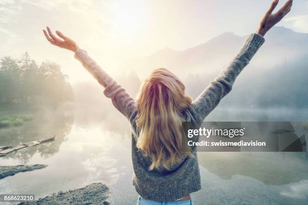 body positive girl enjoying freedom in nature - arms outstretched mountain stock pictures, royalty-free photos & images