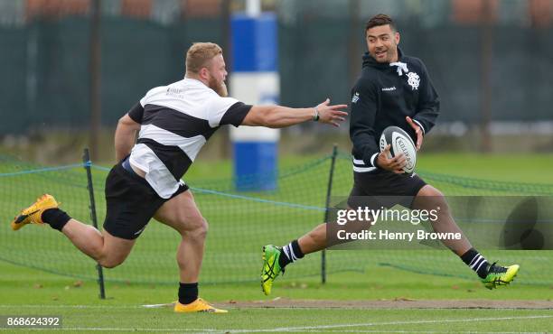 Richie Mo'unga and Akker van der Merwe of Barbarians during a training session at Latymer Upper School playing fields on October 31, 2017 in London,...