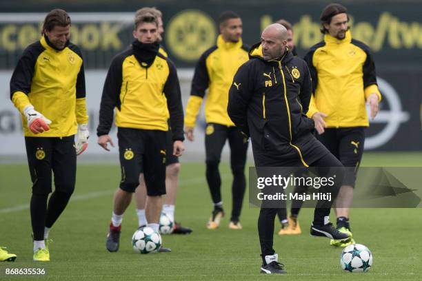 Peter Bosz and team of Borussia Dortmund during the training prior the UEFA Champions League group H match between Borussia Dortmund and APOEL...