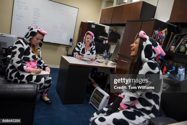 Aides for Sen. Steve Daines, R-Mont., from left, Lindsay Black, Marcie Kinzel, and Katie Waldman, are seen in their Halloween costumes in Hart...