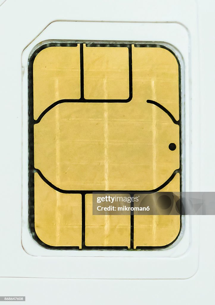 Close-Up Of Sim Card On White Background