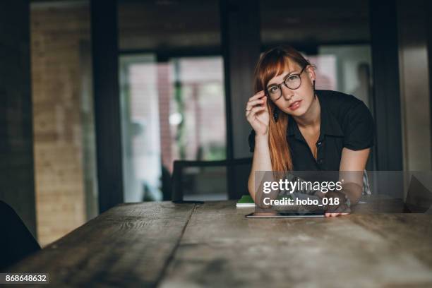 leader at business meeting - graphic design studio stock pictures, royalty-free photos & images