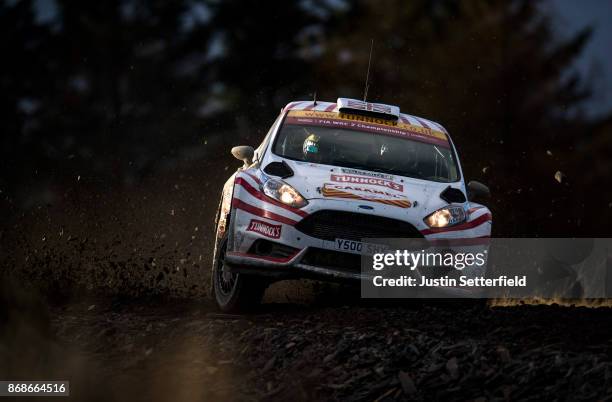 Matthew Wilson of Great Britain drives with co-driver Stuart Loudon of Great Britain during the Sweet Lamb stage of the FIA World Rally Championship...