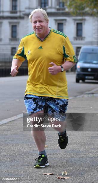 British Foreign Secretary Boris Johnson jogging in Westminster October 31, 2017 in London, England.