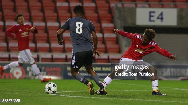 Angel Gomes of Manchester United in action during the UEFA Youth League match between Manchester United and SL Benfica at Leigh Sports Village on...