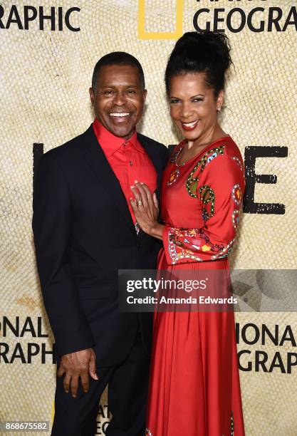 Musician Gralin Jerald and actress Penny Johnson Jerald arrive at the premiere of National Geographic's "The Long Road Home" at Royce Hall on October...