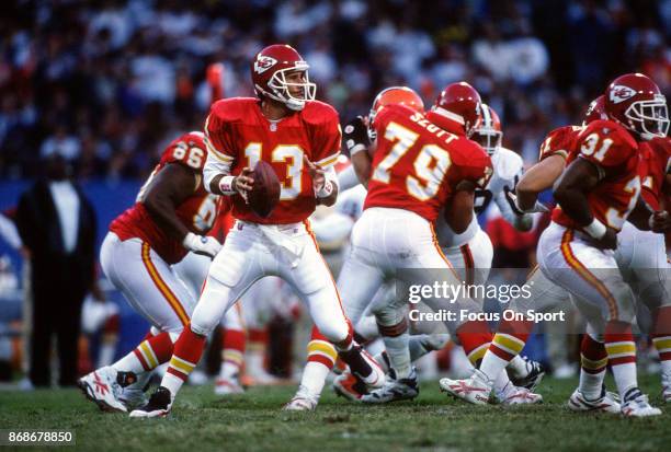 Steve Bono of the Kansas City Chiefs drops back to pass against the Cleveland Browns during an NFL football game September 24, 1995 at Cleveland...
