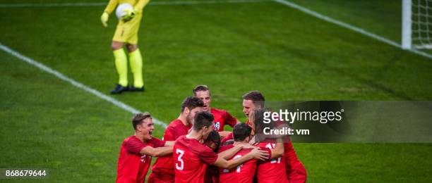 winning football team - soccer team stock pictures, royalty-free photos & images