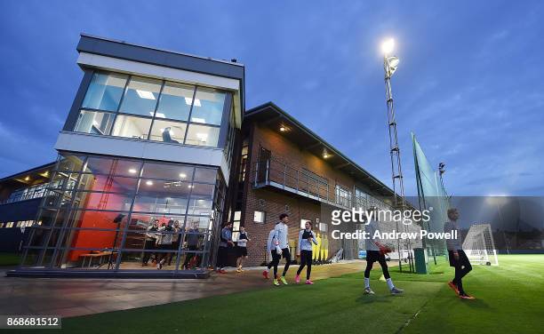 Trent Alexander-Arnold, Loris Karius and Lazar Markovic of Liverpool at the start of a Liverpool training session at Melwood Training Ground on...