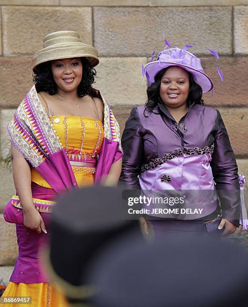 Two of South Africa's newly elected President Jacob Zuma's three wives, Thobeka Mabhija and Nompumelelo Ntuli Zuma arrive at the inauguration...