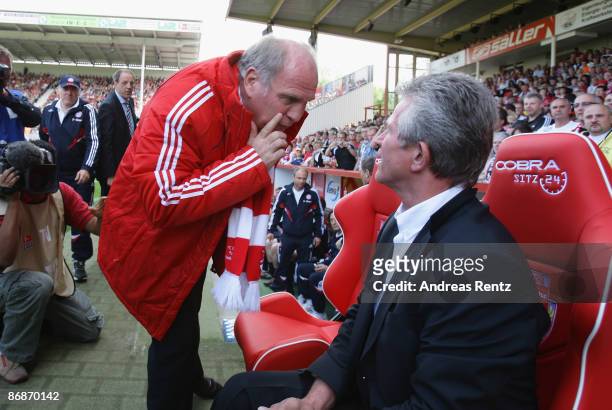 Interim coach Jupp Heynckes speaks to manager Uli Hoeness of Bayern prior to the match during the Bundesliga match between FC Energie Cottbus and...