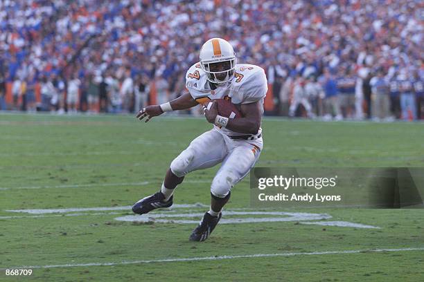 Tailback Travis Stephens of the University of Tennessee Volunteers carries the ball against the University of Florida Gators during the SEC game at...