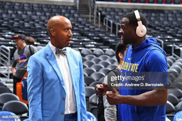 Former NBA player, Bruce Bowen and Draymond Green of the Golden State Warriors talk before the game against the LA Clippers on October 30, 2017 at...