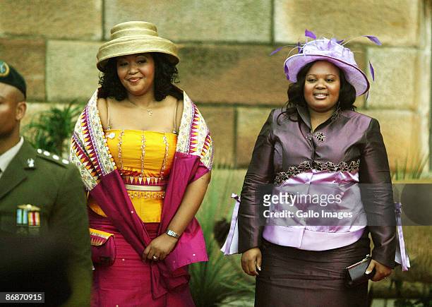 Two of South Africa's newly elected President Jacob Zuma's three wives, Thobeka Mabhija and Nompumelelo Ntuli Zuma arrive at the inauguration...