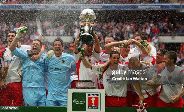 Stevenage Borough players celebrate with the trophy after winning the FA Trophy Final between Stevenage Borough and York City at Wembley Stadium on...