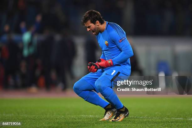 Alisson Becker of AS Roma celebrates the first Roma goal during the UEFA Champions League group C match between AS Roma and Chelsea FC at Stadio...