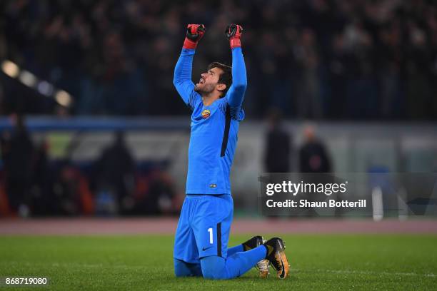 Alisson Becker of AS Roma celebrates the first Roma goal during the UEFA Champions League group C match between AS Roma and Chelsea FC at Stadio...
