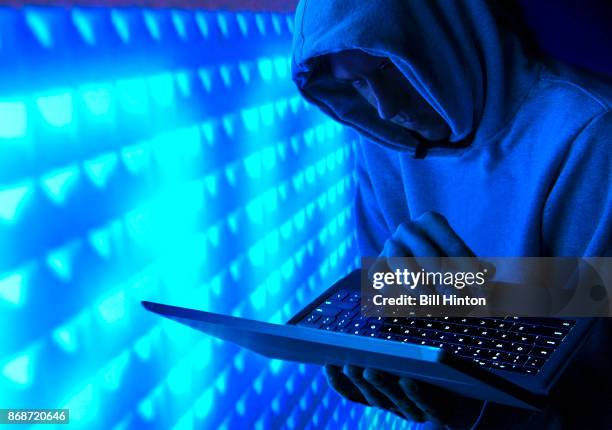 blue hacker - bill hinton stock pictures, royalty-free photos & images