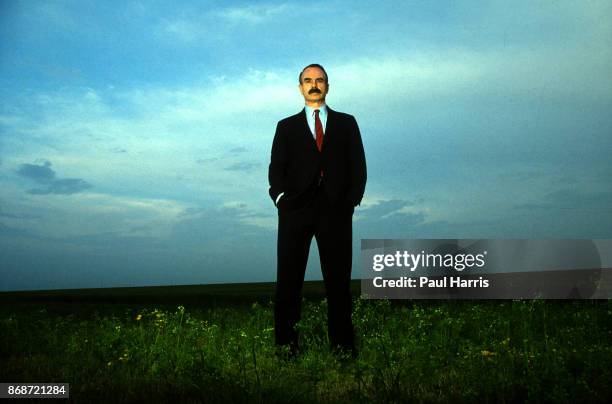 Gordon Liddy stands at the edge of Dallas Fort Worth airport during a promotional book tour for his autobiography " Will" on June 12, 1982 in Dallas...