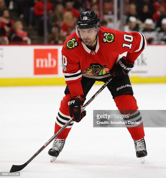 Patrick Sharp of the Chicago Blackhawks awaits a face-off against the Minnesota Wild at the United Center on October 12, 2017 in Chicago, Illinois....