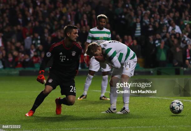Stuart Armstrong of Celtic reacts after he shoots at goal during the UEFA Champions League group B match between Celtic FC and Bayern Muenchen at...