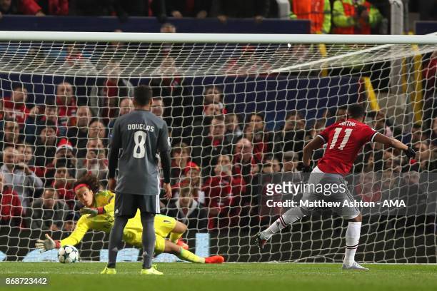 Mile Svilar of Benfica saves the shot of Anthony Martial of Manchester United during the UEFA Champions League group A match between Manchester...